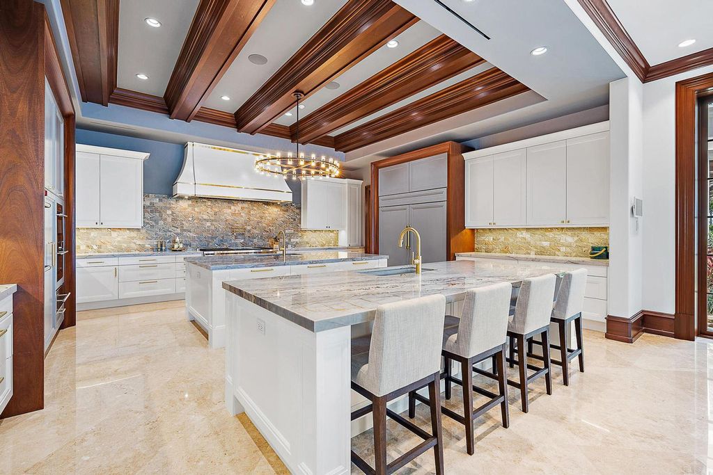 Nestled within the prestigious Admirals Cove community, this Ultimate Trophy Property, originally completed in 2016 and newly remodeled in 2023, offers unparalleled luxury and coastal living.