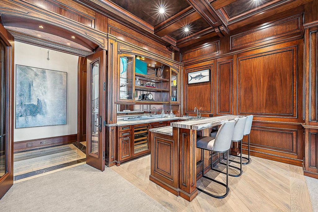 Nestled within the prestigious Admirals Cove community, this Ultimate Trophy Property, originally completed in 2016 and newly remodeled in 2023, offers unparalleled luxury and coastal living.