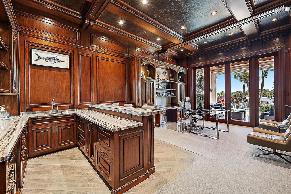 Nestled within the prestigious Admirals Cove community, this Ultimate Trophy Property, originally completed in 2016 and newly remodeled in 2023, offers unparalleled luxury and coastal living.
