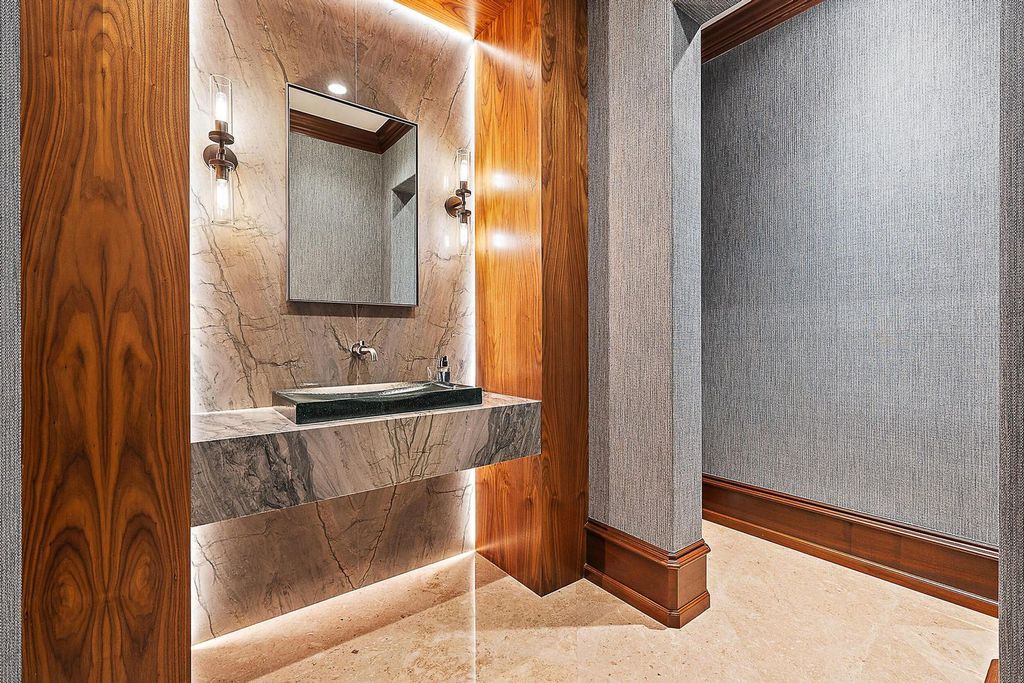 Nestled within the prestigious Admirals Cove community, this Ultimate Trophy Property, originally completed in 2016 and newly remodeled in 2023, offers unparalleled luxury and coastal living.