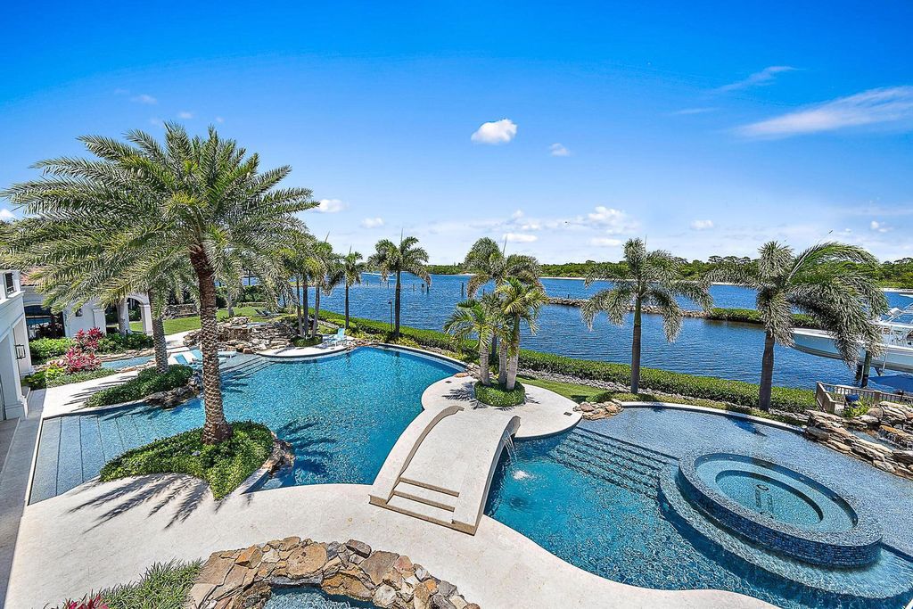 Nestled within the prestigious Admirals Cove community, this Ultimate Trophy Property, originally completed in 2016 and newly remodeled in 2023, offers unparalleled luxury and coastal living.