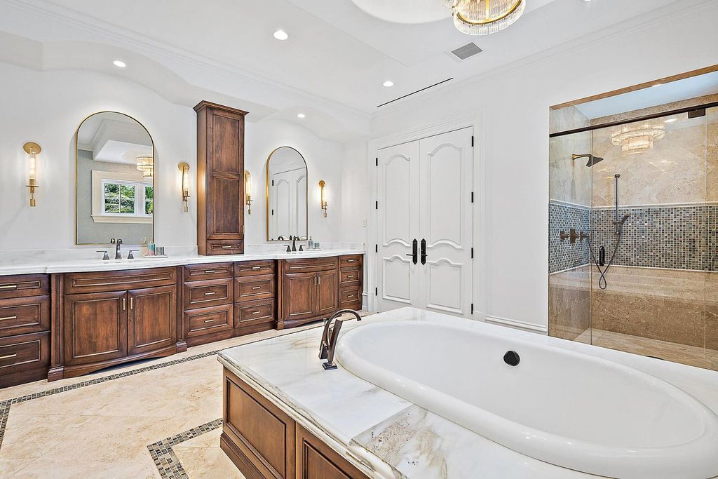 Nestled within the prestigious Admirals Cove community, this Ultimate Trophy Property, originally completed in 2016 and newly remodeled in 2023, offers unparalleled luxury and coastal living.