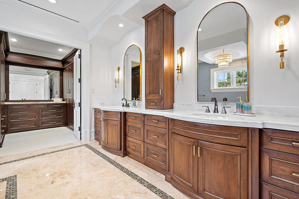 Nestled within the prestigious Admirals Cove community, this Ultimate Trophy Property, originally completed in 2016 and newly remodeled in 2023, offers unparalleled luxury and coastal living.
