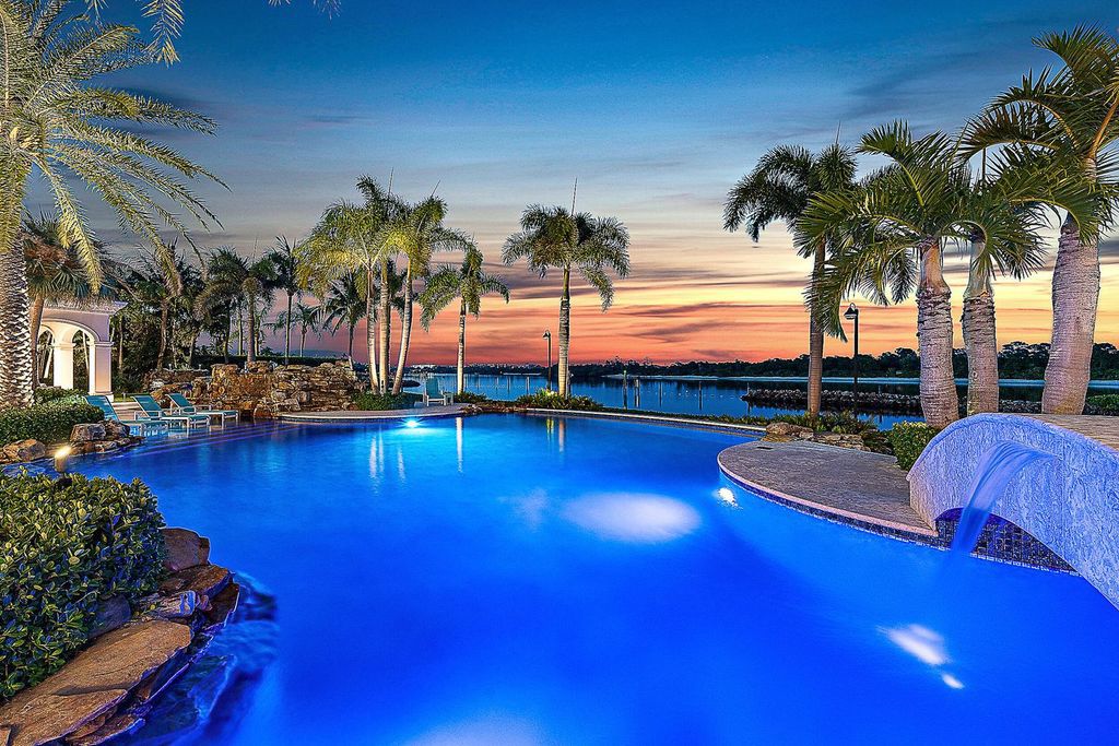 Nestled within the prestigious Admirals Cove community, this Ultimate Trophy Property, originally completed in 2016 and newly remodeled in 2023, offers unparalleled luxury and coastal living.