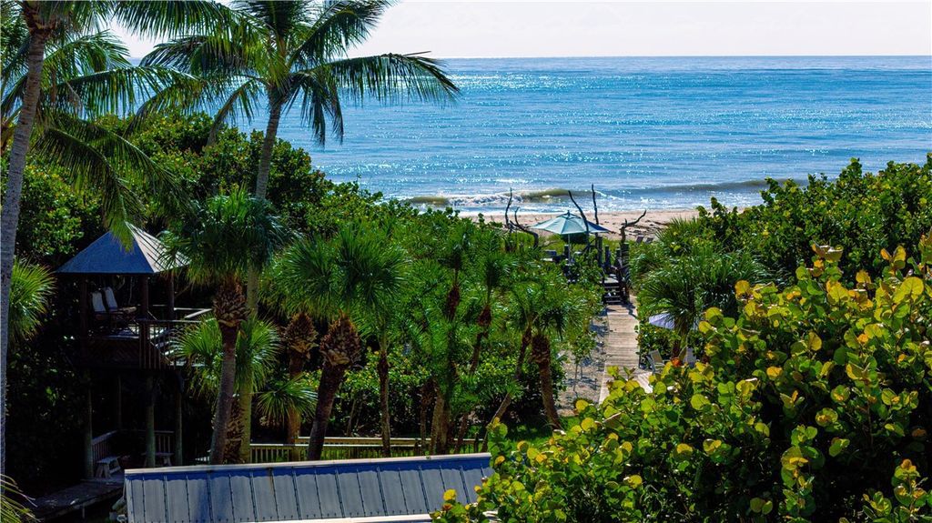 Nestled amid native tropical landscaping, this expansive estate offers a blend of luxury and tranquility. The 1.69-acre estate features a stunning 3,582 square feet main residence with 3 bedrooms and 4 bathrooms, providing ample space for family and guests.