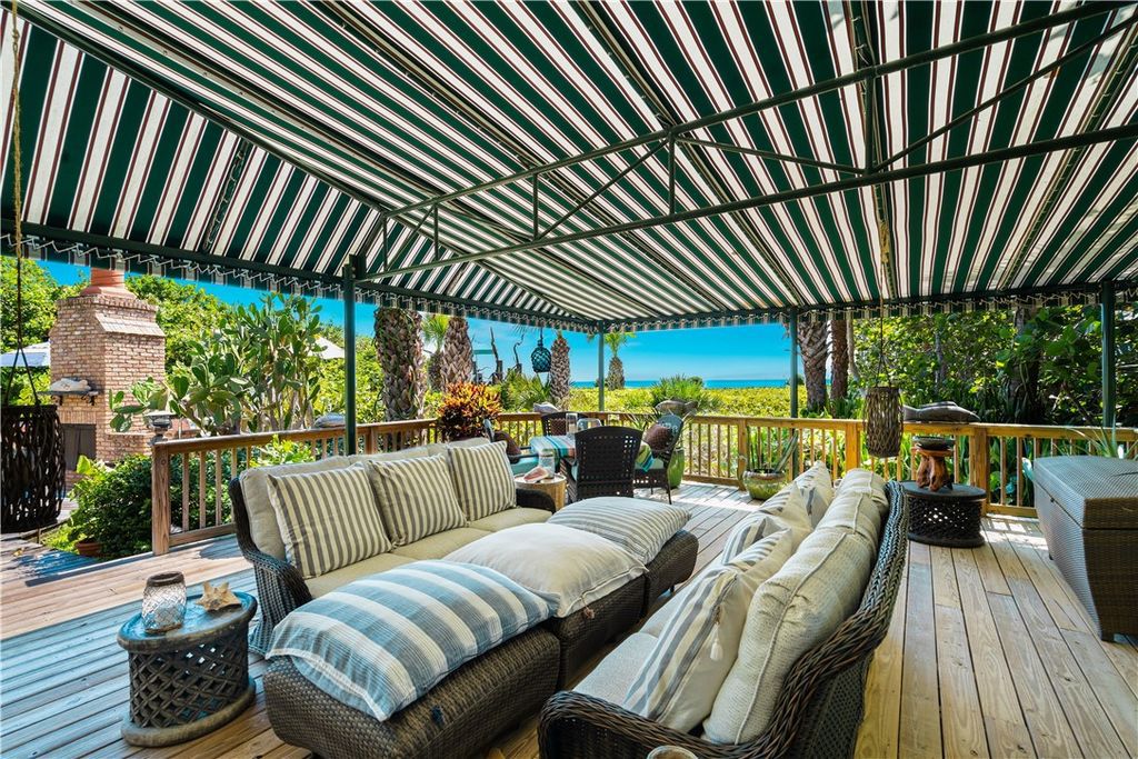 Nestled amid native tropical landscaping, this expansive estate offers a blend of luxury and tranquility. The 1.69-acre estate features a stunning 3,582 square feet main residence with 3 bedrooms and 4 bathrooms, providing ample space for family and guests.