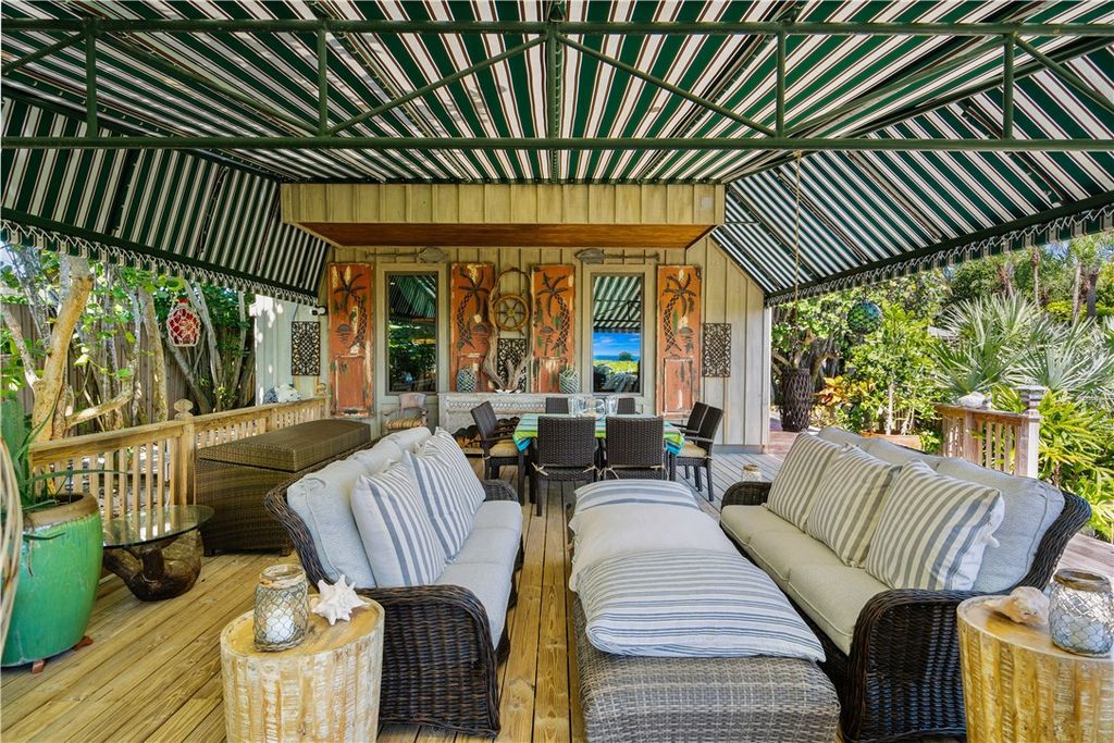 Nestled amid native tropical landscaping, this expansive estate offers a blend of luxury and tranquility. The 1.69-acre estate features a stunning 3,582 square feet main residence with 3 bedrooms and 4 bathrooms, providing ample space for family and guests.