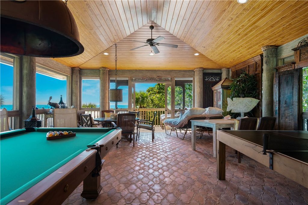 Nestled amid native tropical landscaping, this expansive estate offers a blend of luxury and tranquility. The 1.69-acre estate features a stunning 3,582 square feet main residence with 3 bedrooms and 4 bathrooms, providing ample space for family and guests.