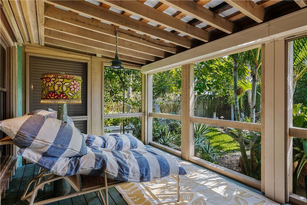 Nestled amid native tropical landscaping, this expansive estate offers a blend of luxury and tranquility. The 1.69-acre estate features a stunning 3,582 square feet main residence with 3 bedrooms and 4 bathrooms, providing ample space for family and guests.