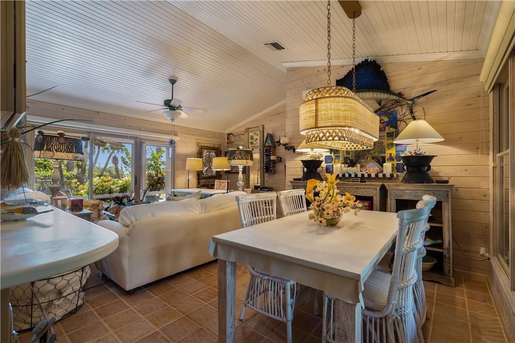 Nestled amid native tropical landscaping, this expansive estate offers a blend of luxury and tranquility. The 1.69-acre estate features a stunning 3,582 square feet main residence with 3 bedrooms and 4 bathrooms, providing ample space for family and guests.