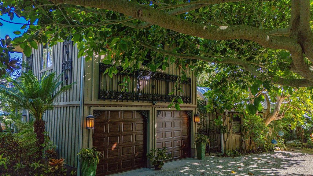 Nestled amid native tropical landscaping, this expansive estate offers a blend of luxury and tranquility. The 1.69-acre estate features a stunning 3,582 square feet main residence with 3 bedrooms and 4 bathrooms, providing ample space for family and guests.