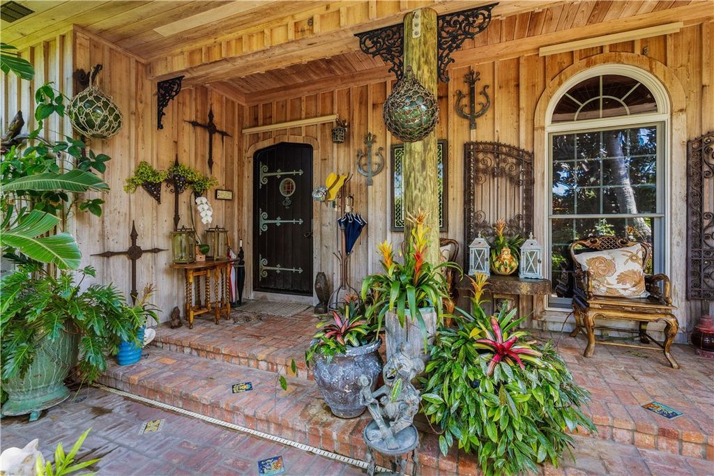 Nestled amid native tropical landscaping, this expansive estate offers a blend of luxury and tranquility. The 1.69-acre estate features a stunning 3,582 square feet main residence with 3 bedrooms and 4 bathrooms, providing ample space for family and guests.