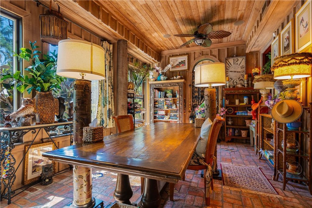 Nestled amid native tropical landscaping, this expansive estate offers a blend of luxury and tranquility. The 1.69-acre estate features a stunning 3,582 square feet main residence with 3 bedrooms and 4 bathrooms, providing ample space for family and guests.