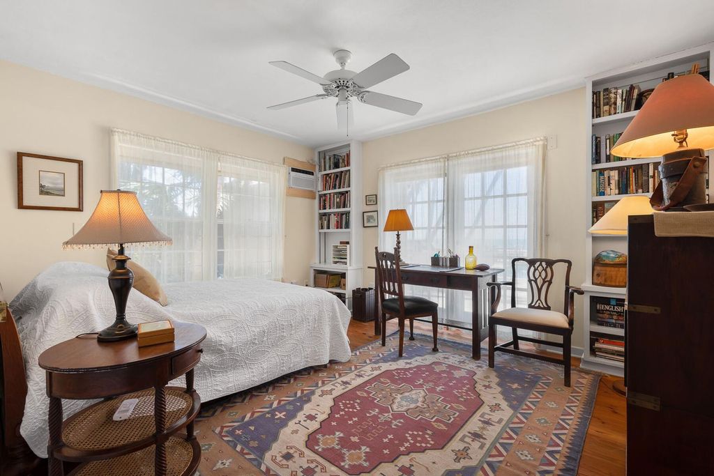 Discover luxury in the Florida Keys with this historic 5-bedroom, 5.5-bathroom home, situated at 400 South St, Key West, FL 33040. Adjacent to the iconic Southernmost Point buoy, this 4,008 square feet residence blends historic charm with modern amenities.