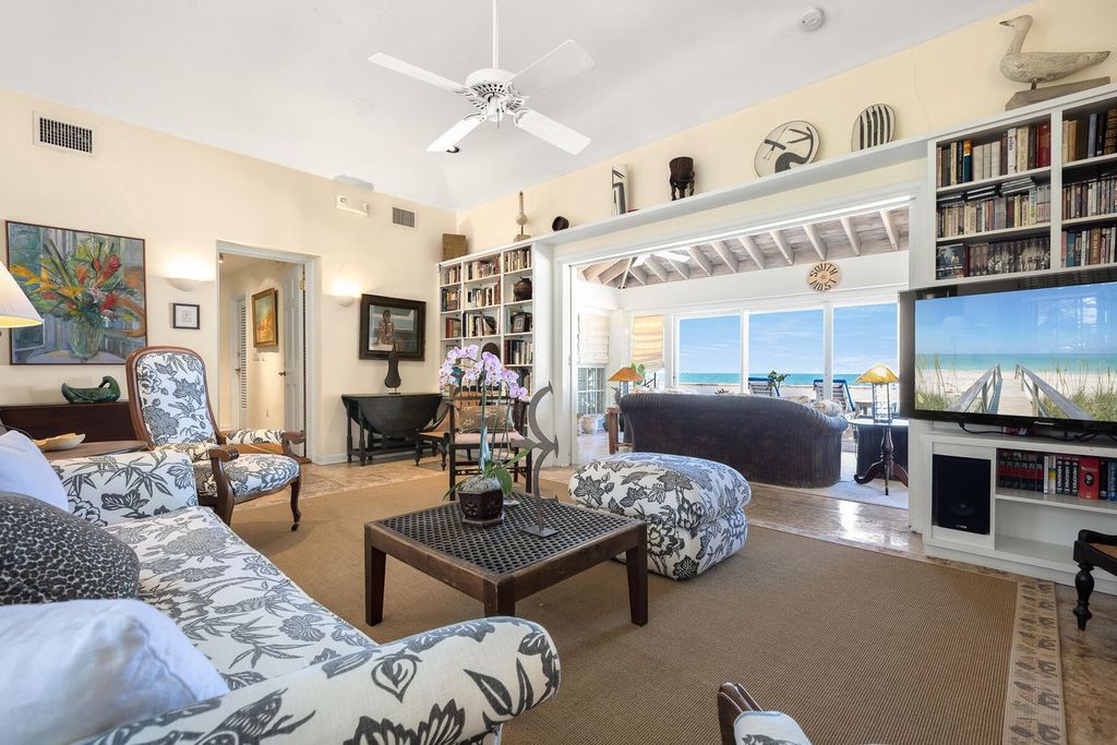 Discover luxury in the Florida Keys with this historic 5-bedroom, 5.5-bathroom home, situated at 400 South St, Key West, FL 33040. Adjacent to the iconic Southernmost Point buoy, this 4,008 square feet residence blends historic charm with modern amenities.