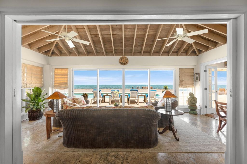 Discover luxury in the Florida Keys with this historic 5-bedroom, 5.5-bathroom home, situated at 400 South St, Key West, FL 33040. Adjacent to the iconic Southernmost Point buoy, this 4,008 square feet residence blends historic charm with modern amenities.