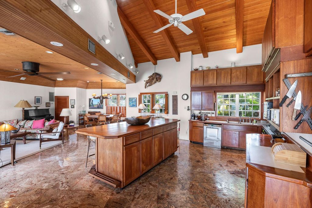 Discover luxury in the Florida Keys with this historic 5-bedroom, 5.5-bathroom home, situated at 400 South St, Key West, FL 33040. Adjacent to the iconic Southernmost Point buoy, this 4,008 square feet residence blends historic charm with modern amenities.