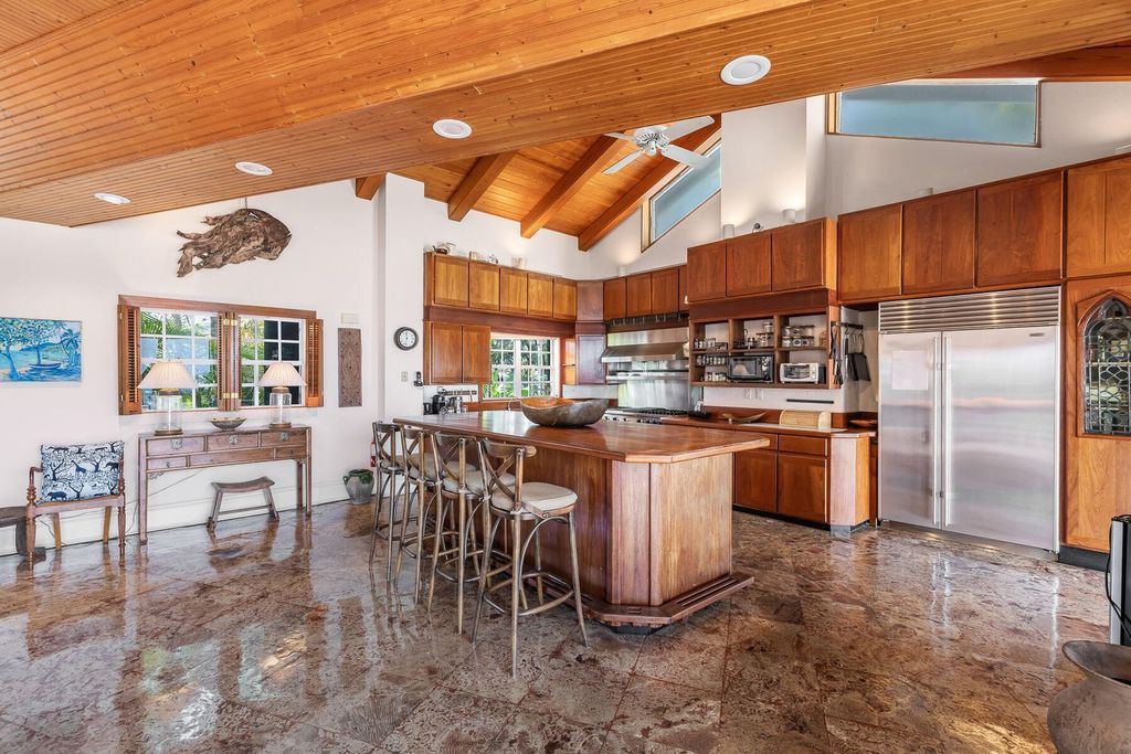 Discover luxury in the Florida Keys with this historic 5-bedroom, 5.5-bathroom home, situated at 400 South St, Key West, FL 33040. Adjacent to the iconic Southernmost Point buoy, this 4,008 square feet residence blends historic charm with modern amenities.