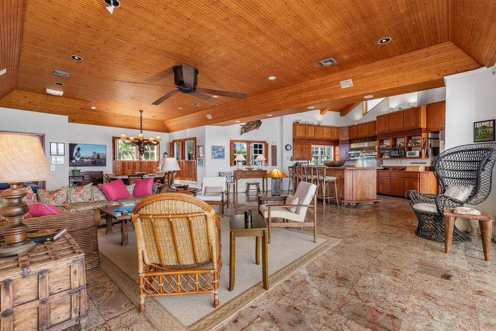 Discover luxury in the Florida Keys with this historic 5-bedroom, 5.5-bathroom home, situated at 400 South St, Key West, FL 33040. Adjacent to the iconic Southernmost Point buoy, this 4,008 square feet residence blends historic charm with modern amenities.