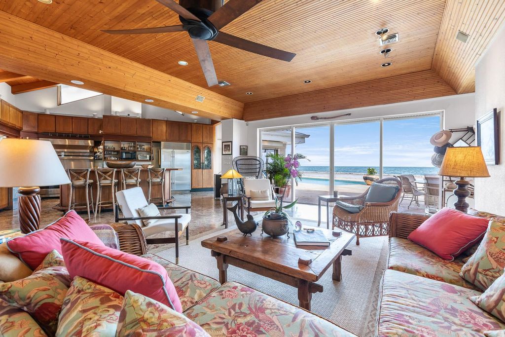 Discover luxury in the Florida Keys with this historic 5-bedroom, 5.5-bathroom home, situated at 400 South St, Key West, FL 33040. Adjacent to the iconic Southernmost Point buoy, this 4,008 square feet residence blends historic charm with modern amenities.