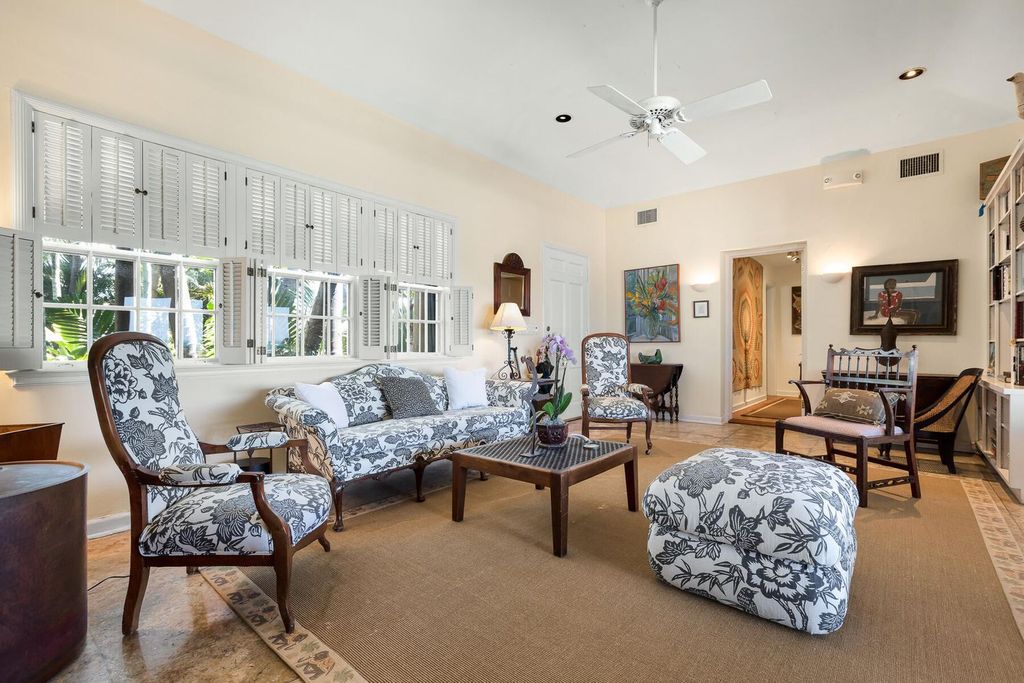 Discover luxury in the Florida Keys with this historic 5-bedroom, 5.5-bathroom home, situated at 400 South St, Key West, FL 33040. Adjacent to the iconic Southernmost Point buoy, this 4,008 square feet residence blends historic charm with modern amenities.