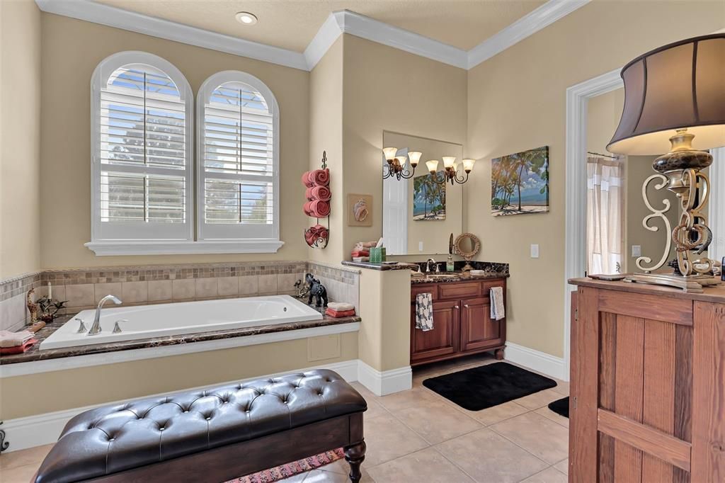 Nestled on 16 acres of meticulously landscaped grounds, this grand mansion boasts nearly 20,000 square feet of exquisitely designed living space.