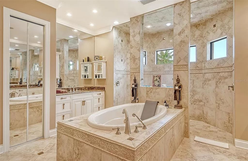 Nestled within the prestigious equestrian community of Foxwood at Panther Ridge, this extraordinary 13-acre estate offers unparalleled luxury country living.