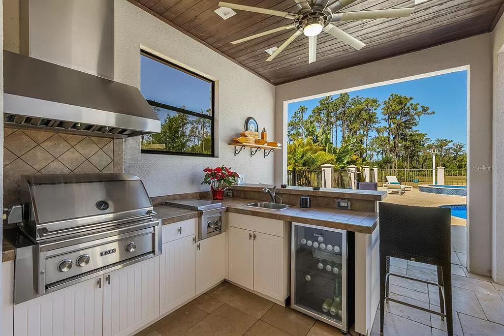 Nestled within the prestigious equestrian community of Foxwood at Panther Ridge, this extraordinary 13-acre estate offers unparalleled luxury country living.
