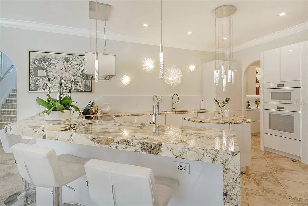 Nestled within the prestigious equestrian community of Foxwood at Panther Ridge, this extraordinary 13-acre estate offers unparalleled luxury country living.