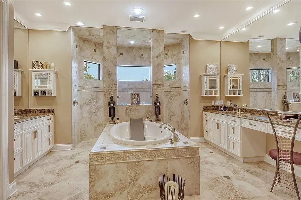 Nestled within the prestigious equestrian community of Foxwood at Panther Ridge, this extraordinary 13-acre estate offers unparalleled luxury country living.