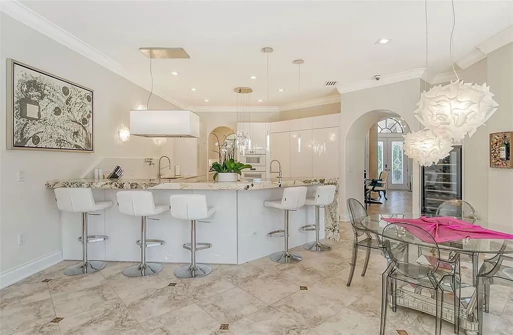 Nestled within the prestigious equestrian community of Foxwood at Panther Ridge, this extraordinary 13-acre estate offers unparalleled luxury country living.