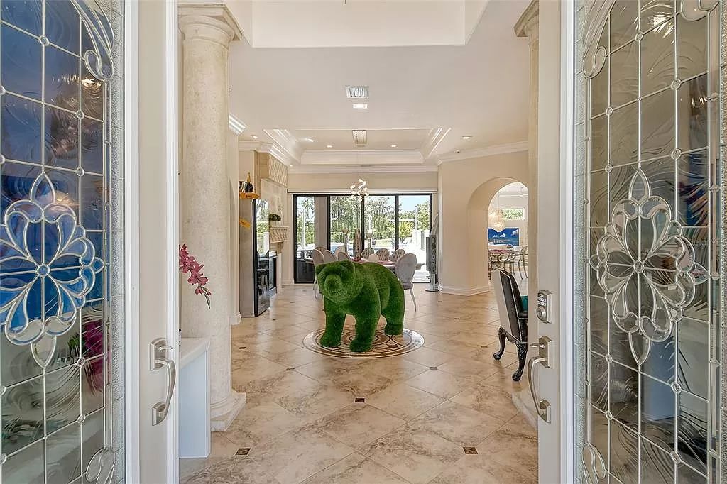 Nestled within the prestigious equestrian community of Foxwood at Panther Ridge, this extraordinary 13-acre estate offers unparalleled luxury country living.