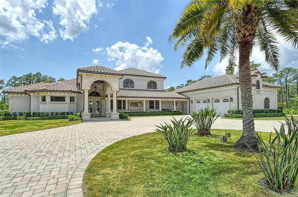 Nestled within the prestigious equestrian community of Foxwood at Panther Ridge, this extraordinary 13-acre estate offers unparalleled luxury country living.