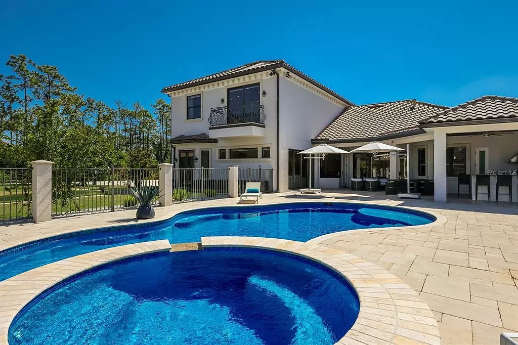 Nestled within the prestigious equestrian community of Foxwood at Panther Ridge, this extraordinary 13-acre estate offers unparalleled luxury country living.