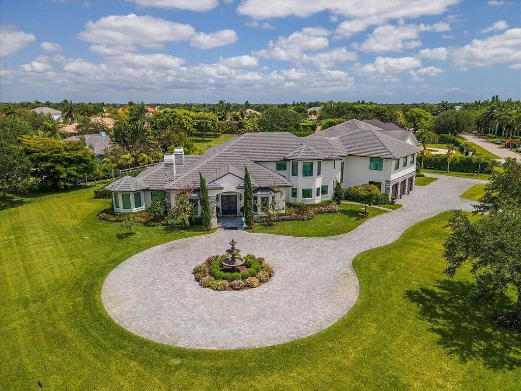 Welcome to this luxurious estate in the prestigious Aero Club. Featuring 7 bedrooms, 8 1/2 bathrooms, and 3 1/2 kitchens, this home is designed for ultimate comfort.