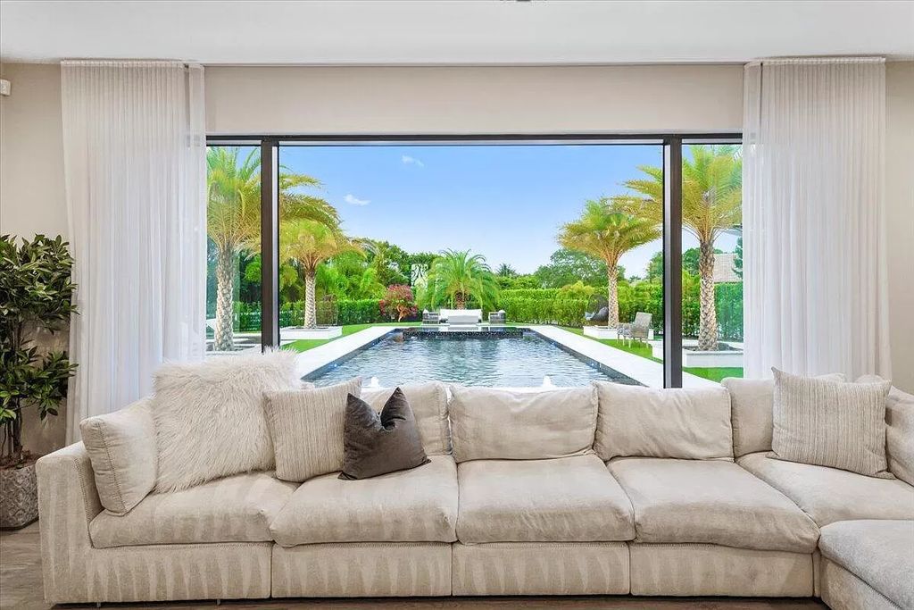 Welcome to this luxurious estate in the prestigious Aero Club. Featuring 7 bedrooms, 8 1/2 bathrooms, and 3 1/2 kitchens, this home is designed for ultimate comfort.