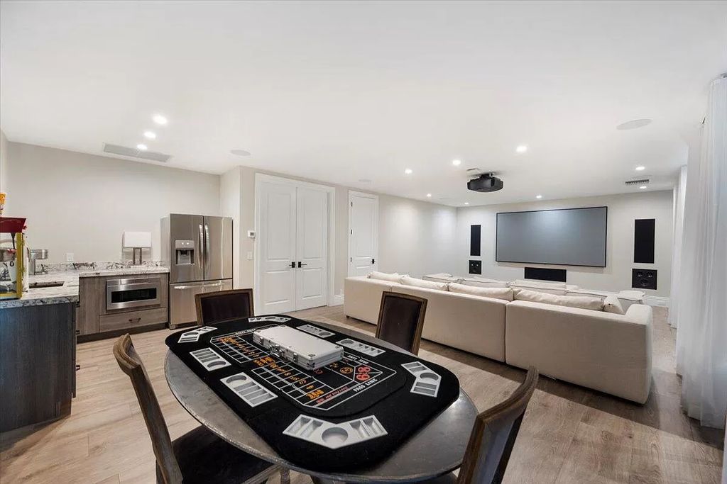 Welcome to this luxurious estate in the prestigious Aero Club. Featuring 7 bedrooms, 8 1/2 bathrooms, and 3 1/2 kitchens, this home is designed for ultimate comfort.