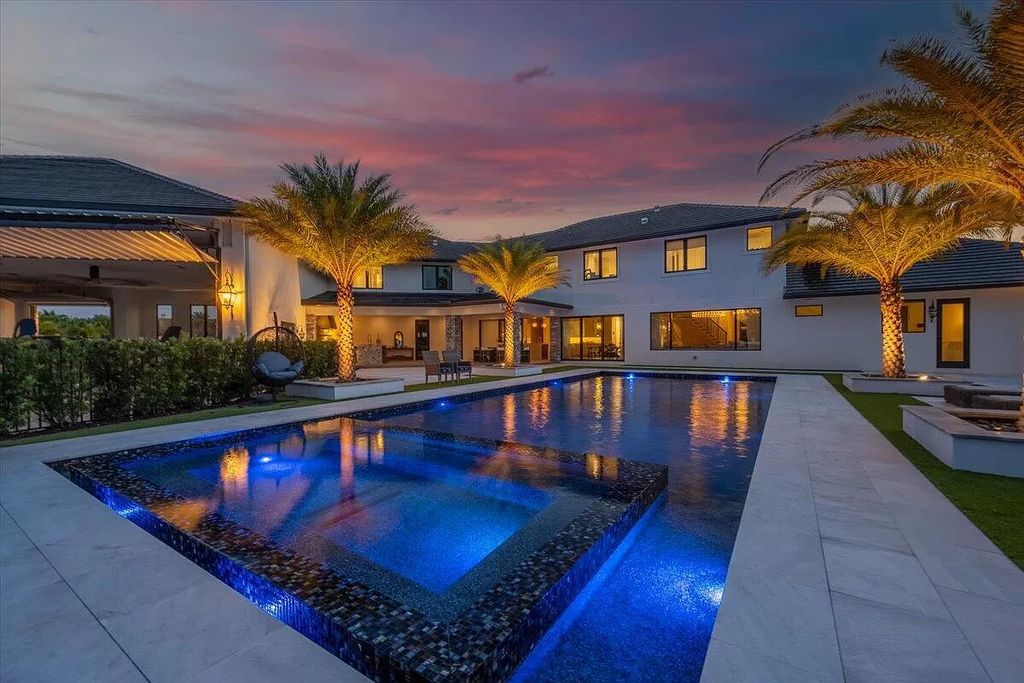 Welcome to this luxurious estate in the prestigious Aero Club. Featuring 7 bedrooms, 8 1/2 bathrooms, and 3 1/2 kitchens, this home is designed for ultimate comfort.