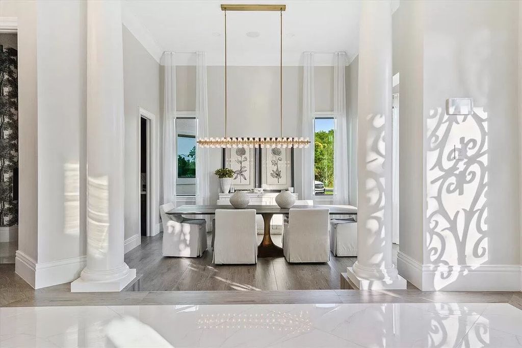 Welcome to this luxurious estate in the prestigious Aero Club. Featuring 7 bedrooms, 8 1/2 bathrooms, and 3 1/2 kitchens, this home is designed for ultimate comfort.