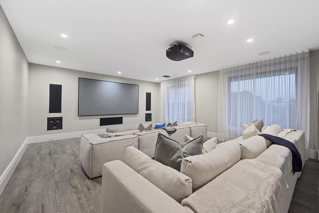 Welcome to this luxurious estate in the prestigious Aero Club. Featuring 7 bedrooms, 8 1/2 bathrooms, and 3 1/2 kitchens, this home is designed for ultimate comfort.