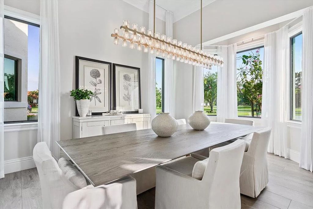 Welcome to this luxurious estate in the prestigious Aero Club. Featuring 7 bedrooms, 8 1/2 bathrooms, and 3 1/2 kitchens, this home is designed for ultimate comfort.