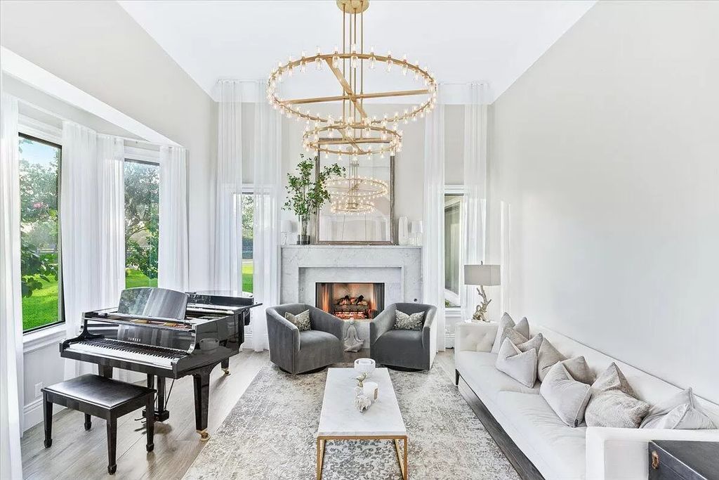 Welcome to this luxurious estate in the prestigious Aero Club. Featuring 7 bedrooms, 8 1/2 bathrooms, and 3 1/2 kitchens, this home is designed for ultimate comfort.