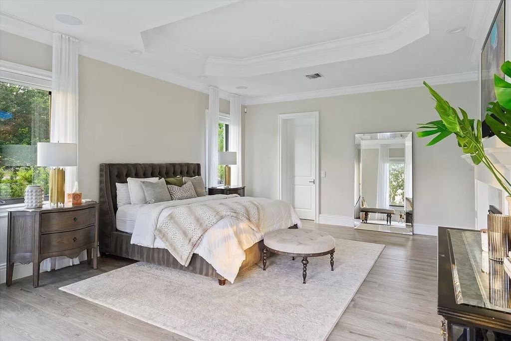Welcome to this luxurious estate in the prestigious Aero Club. Featuring 7 bedrooms, 8 1/2 bathrooms, and 3 1/2 kitchens, this home is designed for ultimate comfort.