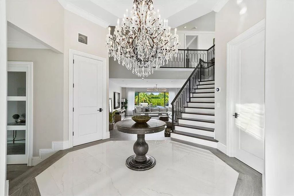 Welcome to this luxurious estate in the prestigious Aero Club. Featuring 7 bedrooms, 8 1/2 bathrooms, and 3 1/2 kitchens, this home is designed for ultimate comfort.