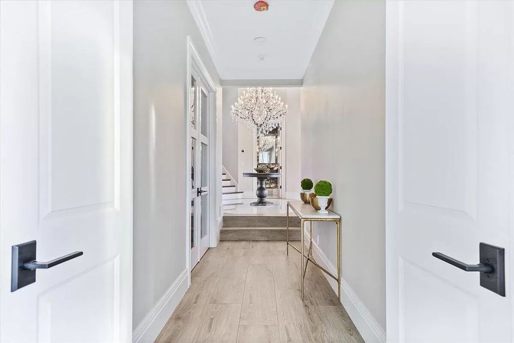 Welcome to this luxurious estate in the prestigious Aero Club. Featuring 7 bedrooms, 8 1/2 bathrooms, and 3 1/2 kitchens, this home is designed for ultimate comfort.