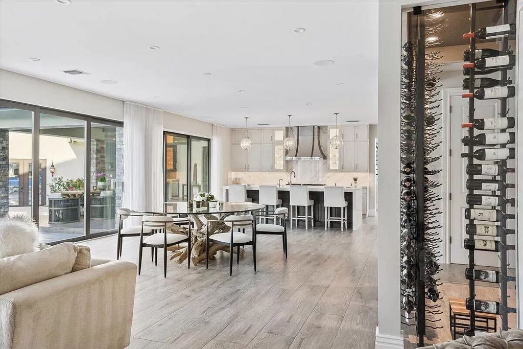 Welcome to this luxurious estate in the prestigious Aero Club. Featuring 7 bedrooms, 8 1/2 bathrooms, and 3 1/2 kitchens, this home is designed for ultimate comfort.