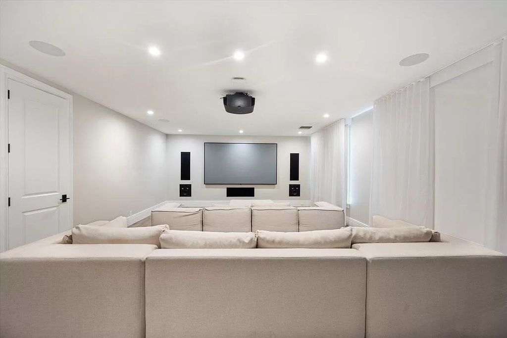 Welcome to this luxurious estate in the prestigious Aero Club. Featuring 7 bedrooms, 8 1/2 bathrooms, and 3 1/2 kitchens, this home is designed for ultimate comfort.