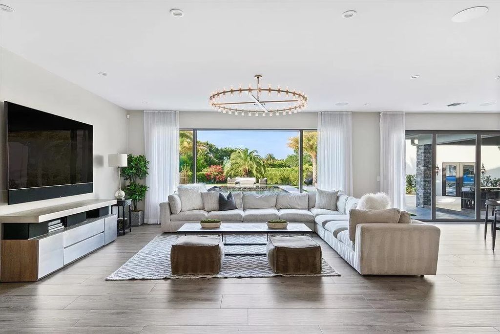Welcome to this luxurious estate in the prestigious Aero Club. Featuring 7 bedrooms, 8 1/2 bathrooms, and 3 1/2 kitchens, this home is designed for ultimate comfort.