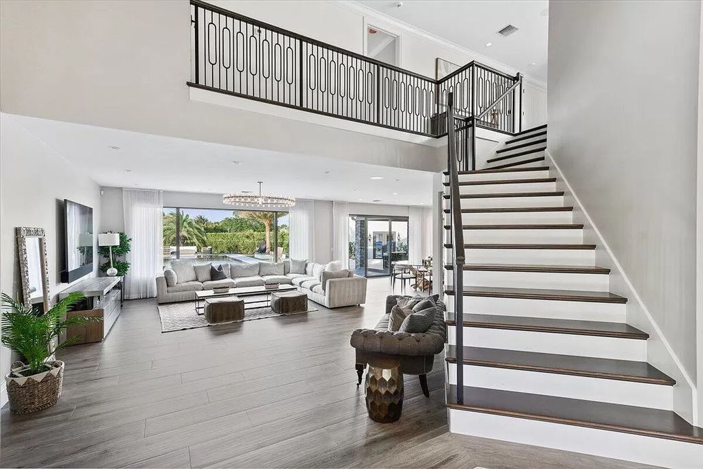 Welcome to this luxurious estate in the prestigious Aero Club. Featuring 7 bedrooms, 8 1/2 bathrooms, and 3 1/2 kitchens, this home is designed for ultimate comfort.