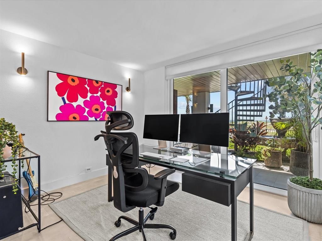 Enjoy modern elegance with breathtaking ocean views, a gourmet kitchen with marble countertops, a state-of-the-art water vapor fireplace, and over 10 TVs.